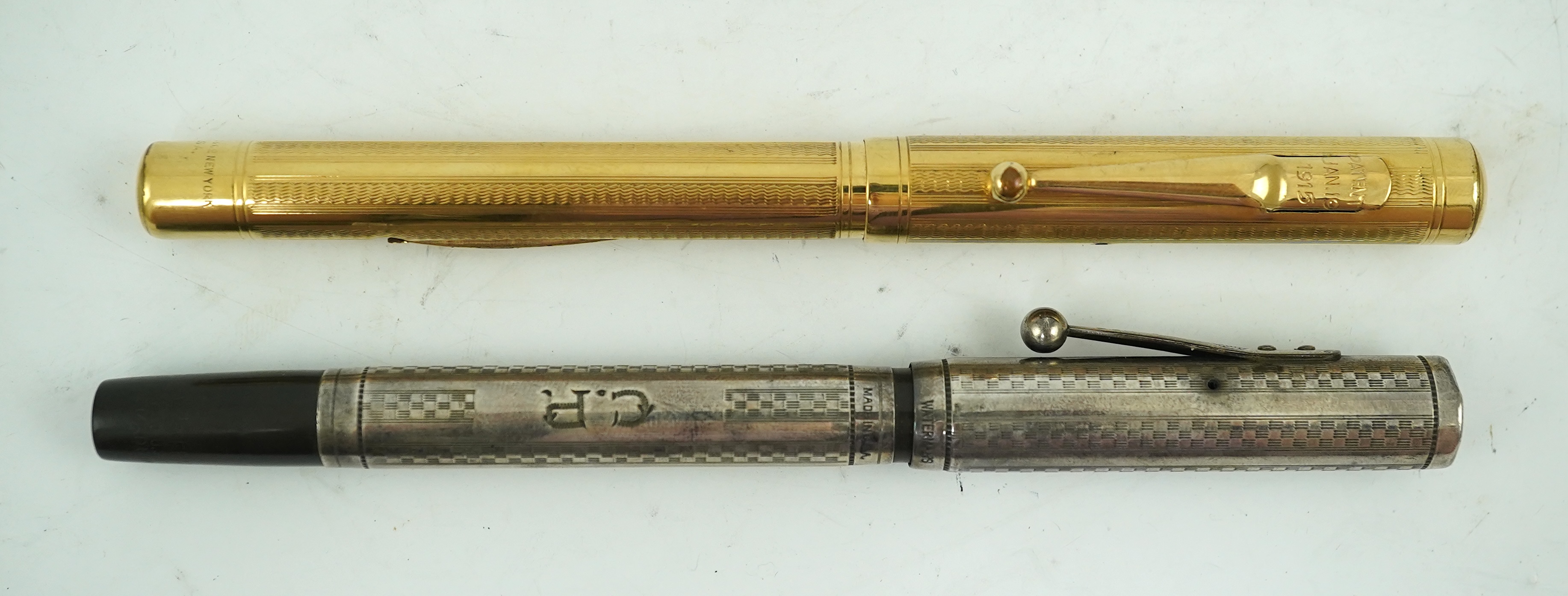 A Swan lever fill fountain pen and a sterling silver Waterman